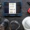 Composition with digital tablet and electrician work items.