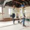 Construction worker, busy and team working building development, maintenance and property upgrade t