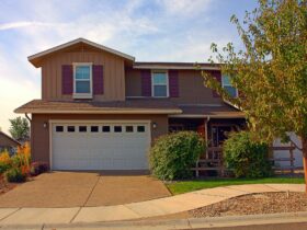 House and driveway in suburban neighborhood