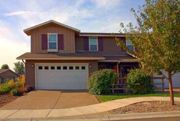 House and driveway in suburban neighborhood