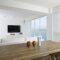 Interior of apartment, living room overlooking the sea.