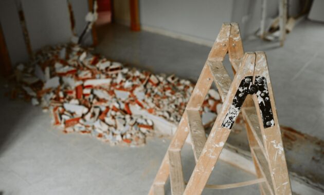 ladder and debris at home construction site. Home renovation