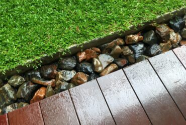 Lawn and rocks at the edge of balcony
