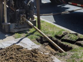 Low angle view of trenchless laying of communications, pipes and water pipes
