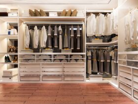 luxury wood walk in closet with wardrobe and wood floor