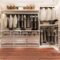 luxury wood walk in closet with wardrobe and wood floor