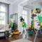 Mixed race janitors doing spring cleaning of house