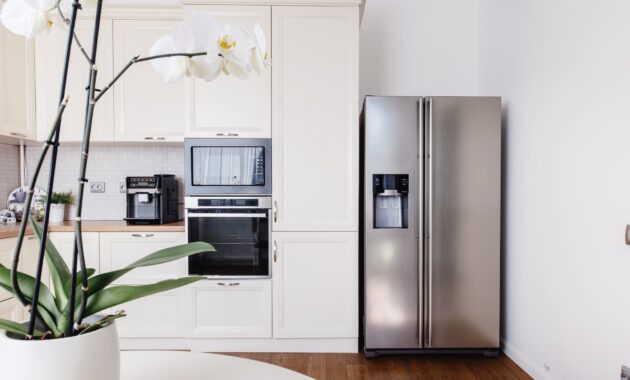 Modern appliances and new design in kitchen. Loft kitchen and apartment