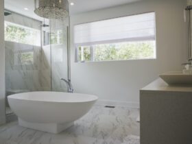 Modern interior design luxury bathroom with bath and glass walled shower