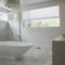 Modern interior design luxury bathroom with bath and glass walled shower
