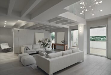 Modern Living Room in the Attic Room with Wooden Floor