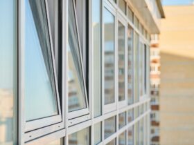 PVC windows on facade of skyscraper. Plastic double glazed windows. Building exterior.