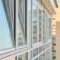 PVC windows on facade of skyscraper. Plastic double glazed windows. Building exterior.