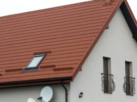 Roof of a new house made from yellow roofing tiles