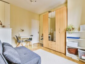 Spacious study room with table and shelves