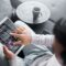 Tablet, sofa or man with smart home system for air conditioning, safety security network or house a