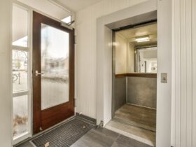the front door of a building with a large window