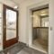 the front door of a building with a large window