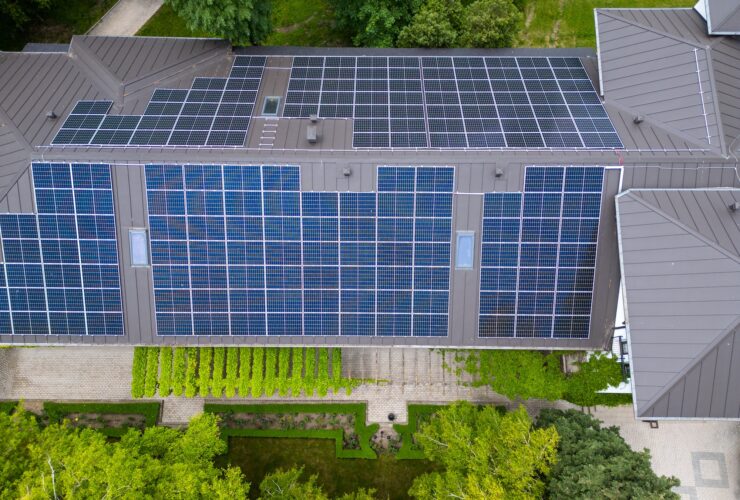 The modern house with a roof designed as a large solar panel, blending style and sustainability. Its