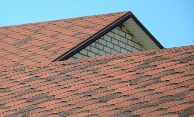 The roof is covered with bituminous shingles of brown color. Quality Roofing