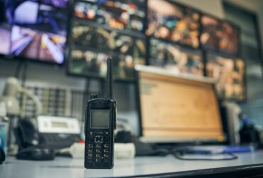 Walkie-talkie placed on an office desk in a control room