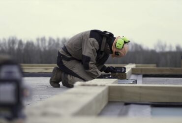 A Worker In Special Protective Uniform Leveling A 2022 12 13 06 40 43 Utc