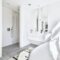 Bright white master bathroom with tub