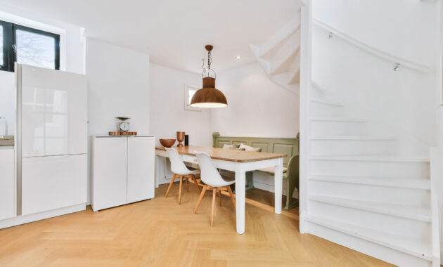 Light modern kitchen with wooden floor