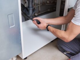 Male Plumber Repair Sink Pipe In Kitchen 2022 12 16 12 39 25 Utc