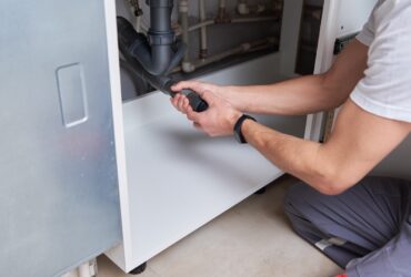Male Plumber Repair Sink Pipe In Kitchen 2022 12 16 12 39 25 Utc