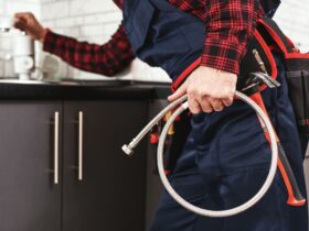New plumbing. Close-up of foreman checking all things before start faucet