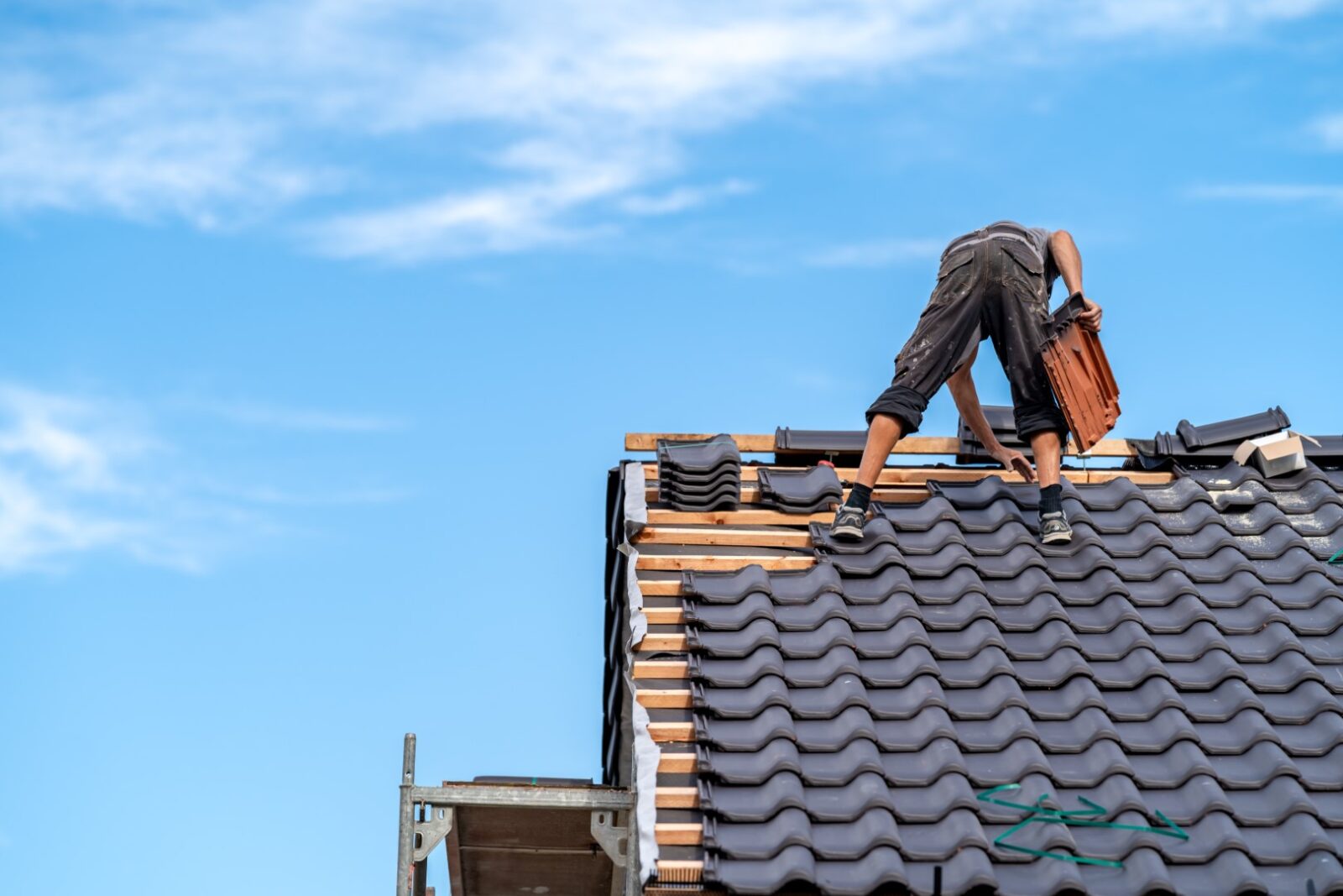 New Roof Of A Family House A Worker Builds A Roof 2023 09 12 18 14 16 Utc