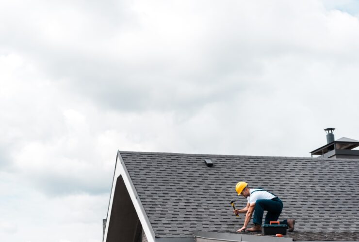 Repairman In Helmet Holding Hammer While Repairing 2022 12 16 19 56 00 Utc