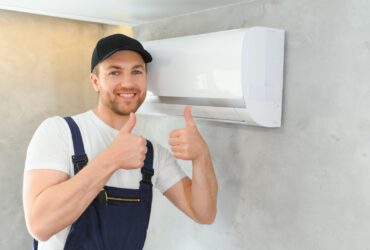 Smiling Young Male Electrician Repair Conditioner 2023 09 19 00 30 14 Utc