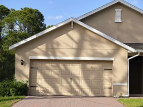 Wide garage double door and concrete driveway of new modern american house