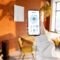 Woman Holding Phone With Running Smart Home Applic 2022 04 24 23 52 03 Utc
