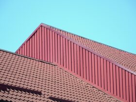 A Fragment Of A Roof From A Metal Tile Of Dark Red 2022 11 12 14 58 00 Utc