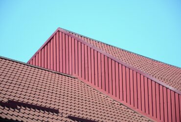 A Fragment Of A Roof From A Metal Tile Of Dark Red 2022 11 12 14 58 00 Utc