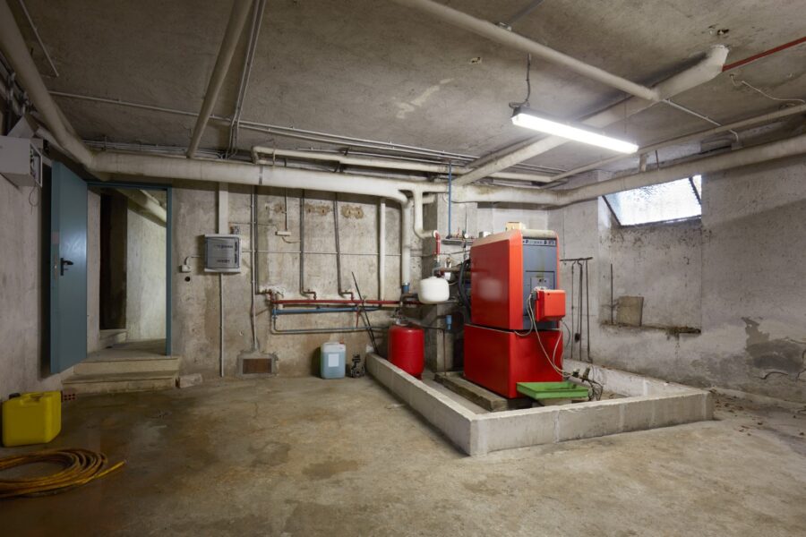 Basement With Red Heating Boiler In Old House Inte 2021 08 26 22 35 04 Utc