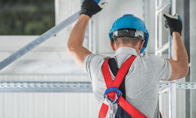 Construction Worker Climbing On Aluminium Scaffold 2022 12 16 11 53 35 Utc