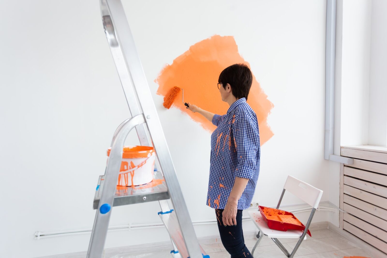 Pretty Smiling Middle Aged Woman Painting Interior 2021 12 09 07 27 15 Utc