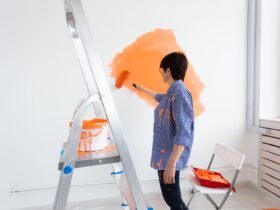 Pretty Smiling Middle Aged Woman Painting Interior 2021 12 09 07 27 15 Utc