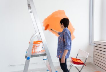 Pretty Smiling Middle Aged Woman Painting Interior 2021 12 09 07 27 15 Utc