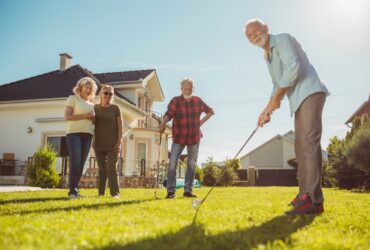 Senior Neighbors Having Fun Playing Mini Golf In T 2023 05 12 22 58 43 Utc