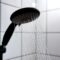 Water from the shower in the modern bathroom