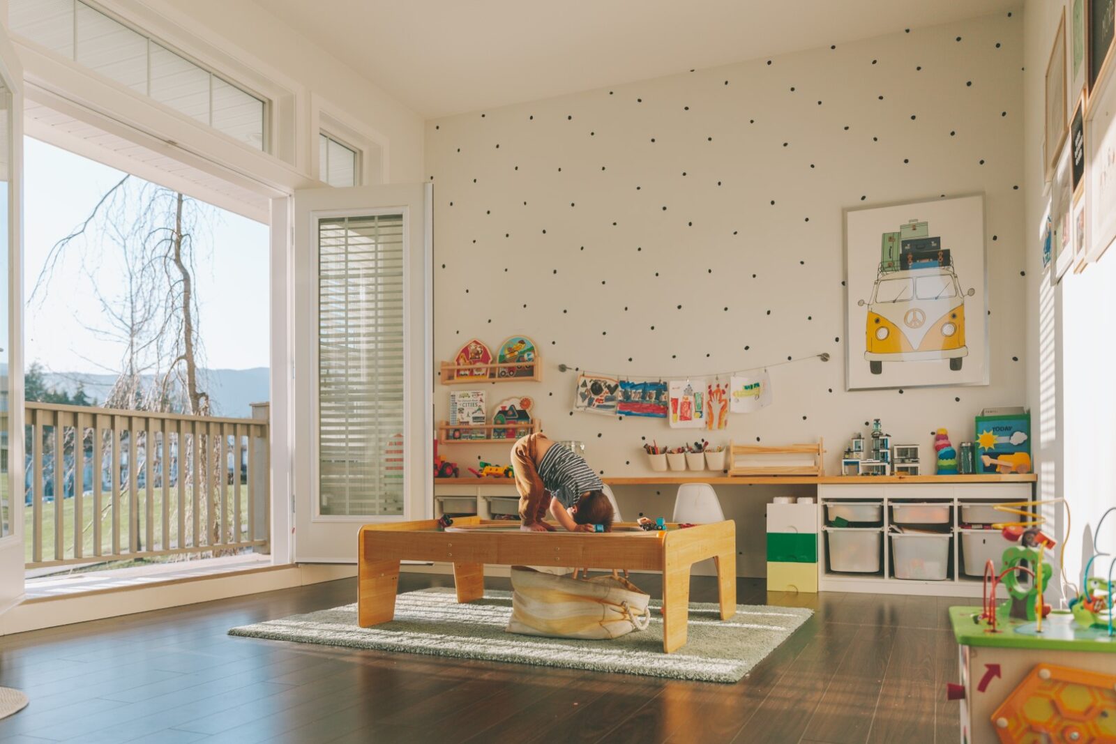 A Baby Playing On A Table In A Playroom With Sunli 2023 11 27 05 14 30 Utc