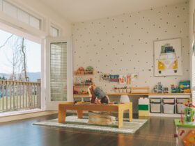 A Baby Playing On A Table In A Playroom With Sunli 2023 11 27 05 14 30 Utc