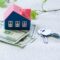 Model House Stands Next To Green Trees Dollars An 2023 11 27 05 06 28 Utc