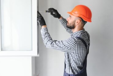 Worker In Installing White Plastic Upvc Window On 2023 11 27 05 28 41 Utc