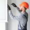 Worker In Installing White Plastic Upvc Window On 2023 11 27 05 28 41 Utc